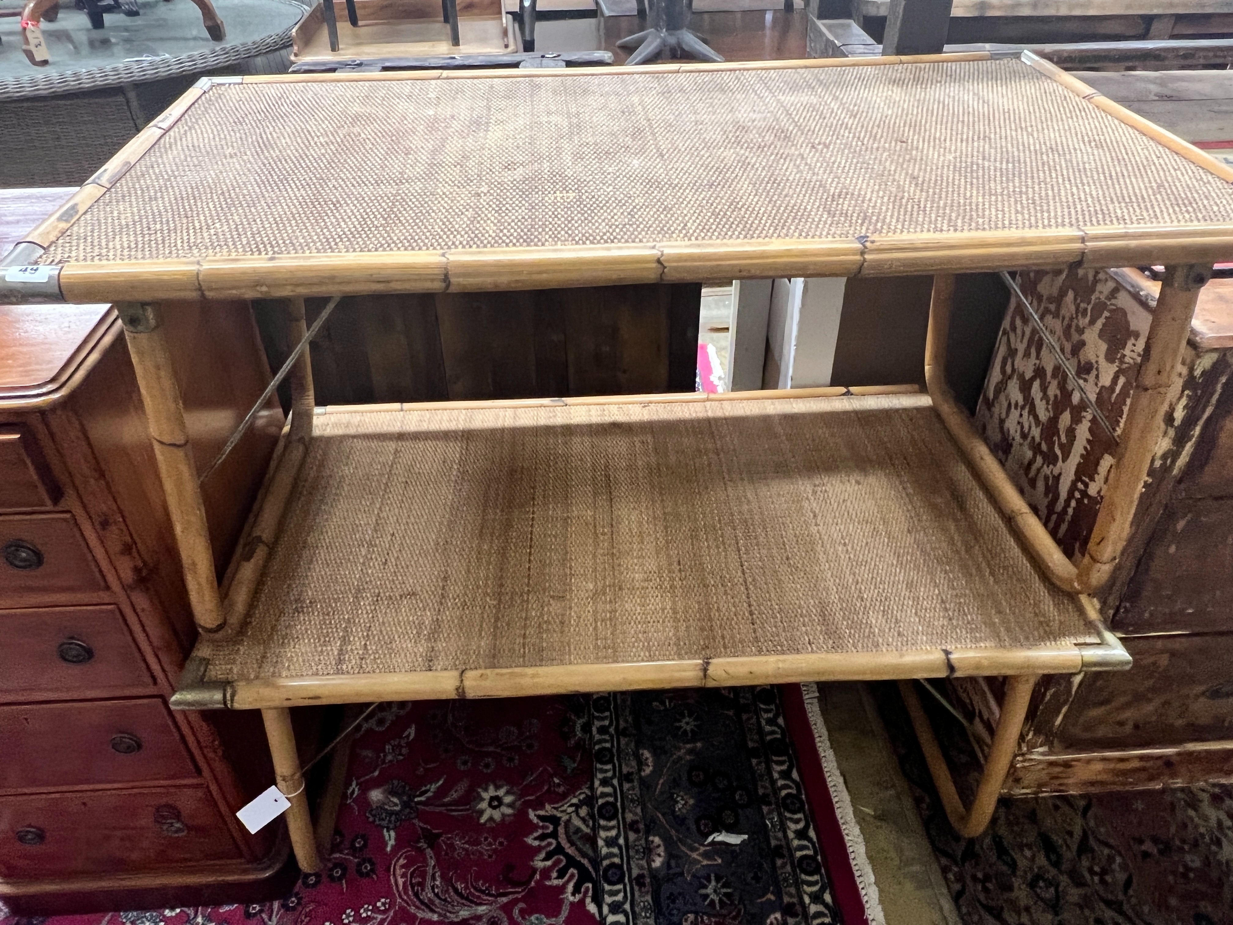 A pair of rectangular folding caned bamboo and rattan low tables, width 110cm, depth 60cm, height 52cm
